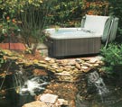 portable hot tub with rock garden picture